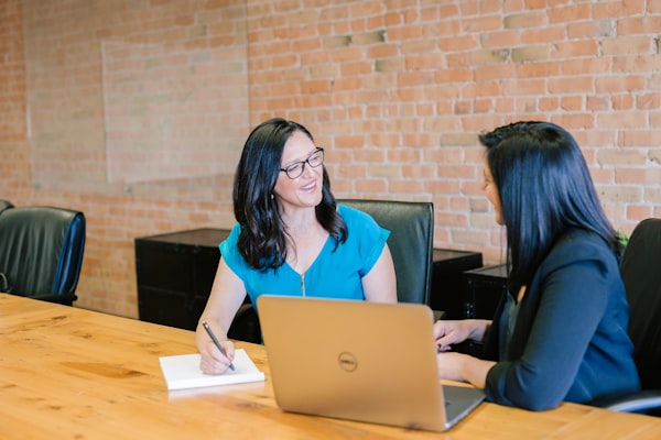 Healthcare professional dictating professional colleague message